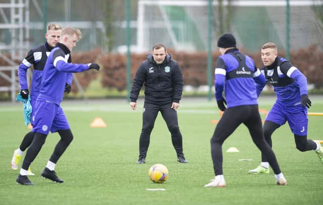 Hibs manager Shaun Maloney joins in at training