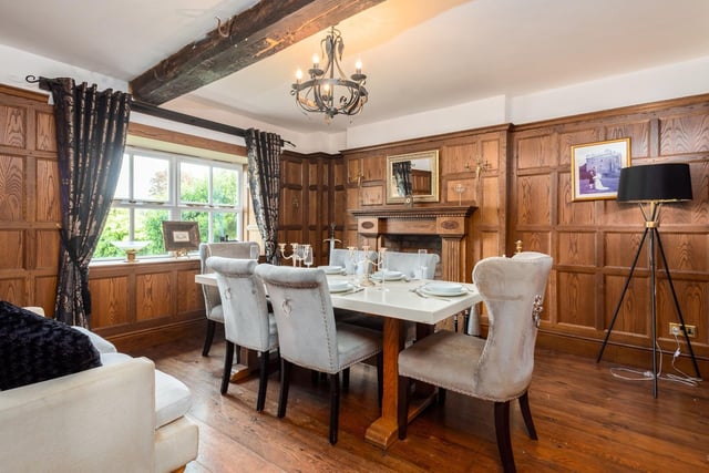 The stunning dining room is finished with wainscot pannelling and original period features throughout, giving the room charm and character.