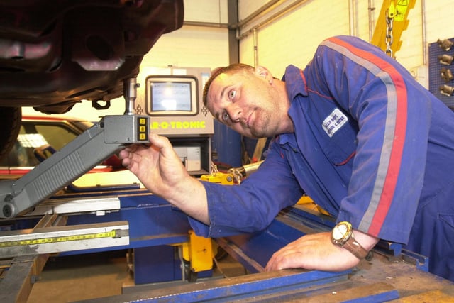 Shaun Wigfield  body repairer at work with the Car-O-Liner Tronic Jig at Halls Body Repair Centre