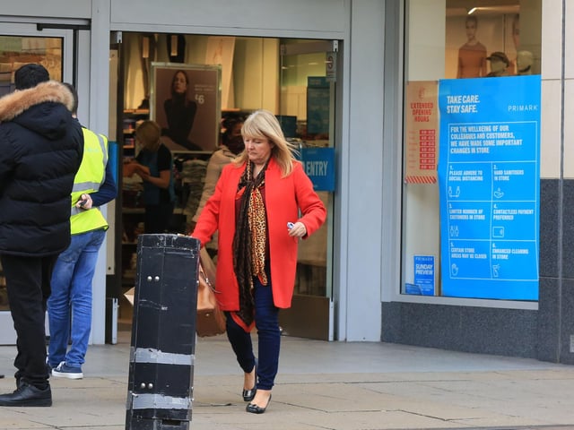 Shoppers carried bags as retail returned. Shoppers outside Primark as Doncaster was put tier three restrictions today.. Picture: Chris Etchells