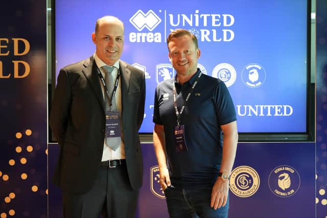 Errea's vice president with Sheffield United's chief executive Steve Bettis