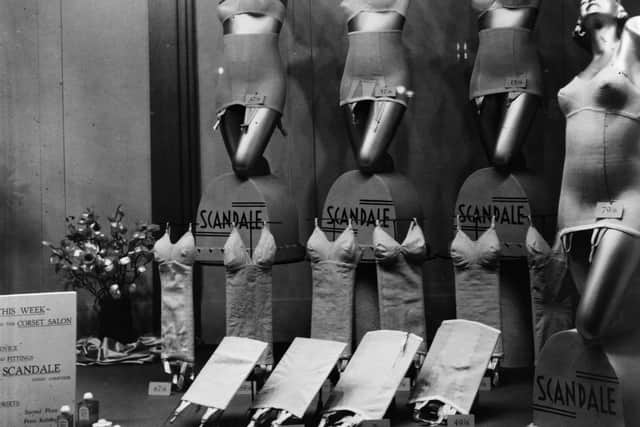 An elegant window display of Scandale corsets and suspenders.   (Photo by Hulton Archive/Getty Images)