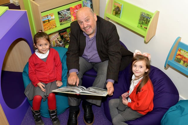 Ray Spencer is pictured reading in the new library at Biddick Hall Infant School three years ago. Remember this?