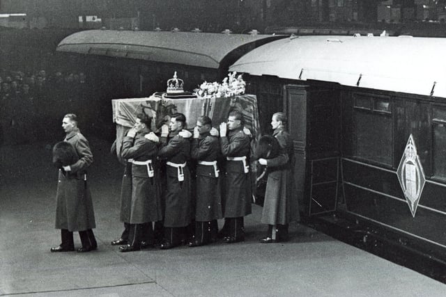 The King's coffin is taken from the train at Kings Cross on February 11, 1952