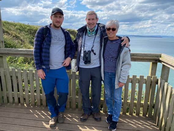 Stephen (centre) on one of his favourite walks with Angela and son Luke