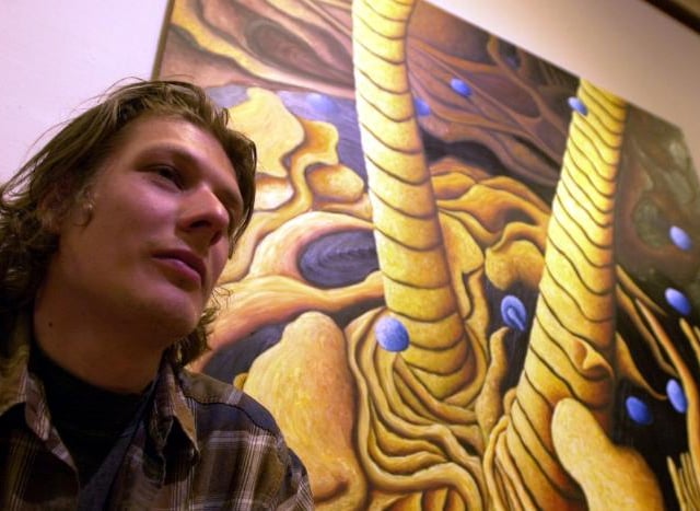 Jonathan Annable with his painting tittled 'hairs' which was on display at the Doncaster Museum in 2000.