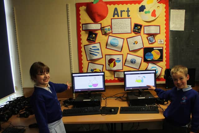 Pupils at Royd Nursery and Infant School showing off some of the technology the school has to offer