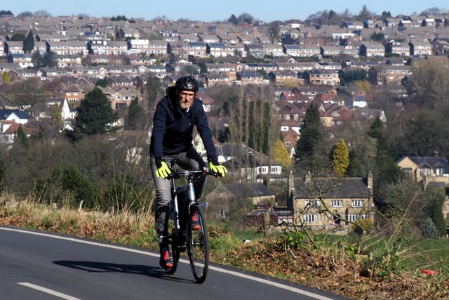 Steve Haake cycling above Lodge Moor