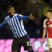 Chey Dunkley has joined Sheffield Wednesday's League One rivals Shrewsbury Town.