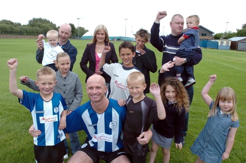 Ten young Owls fans named supporters of the year pictured at Middlewood Training ground in June 2004 with Owls captain Chris Marsden. They are: Luca Jeffrey, Georgina Hennessy, Bradley Royle, Kane Spooner, Charlie Trueman-Smith, Jessica Derbyshire, Oliver Wardman, Emma Henson, Chloe Prescott and Alistair Zeraati