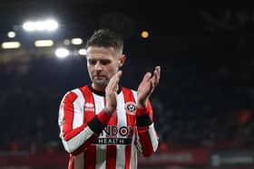 Oliver Norwood of Sheffield United applauds the fans: Lexy Ilsley/ Sportimage