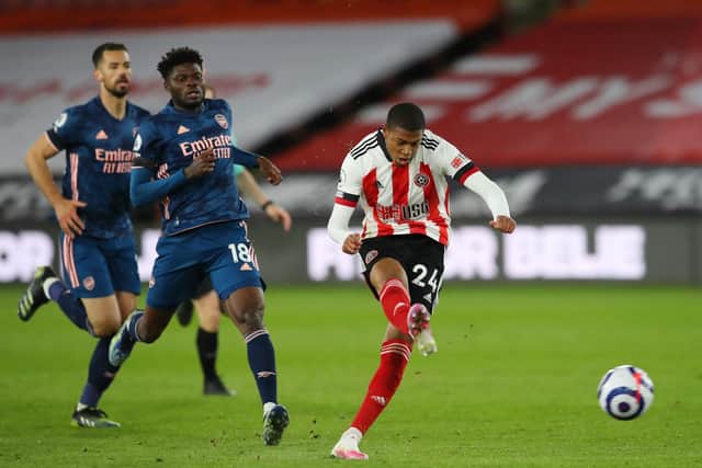 Brewster shoots on goal from long range against Arsenal: Simon Bellis/Sportimage