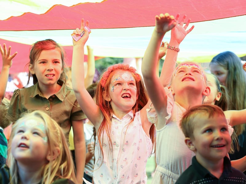 A brightly-coloured parachute provided lots of fun