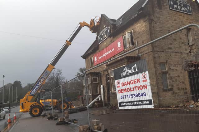 Demolition work today appeared to be underway on a landmark Sheffield pub, after a battle to save it failed. PIctures show workmen on site removing parts of the building