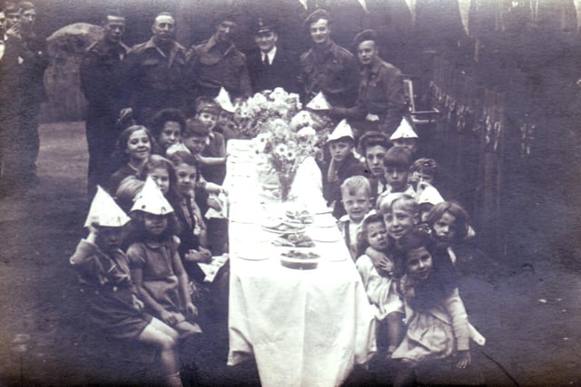 VE Day Party, York Road. Alex Swift submitted this picture and his father is the soldier on the far right
