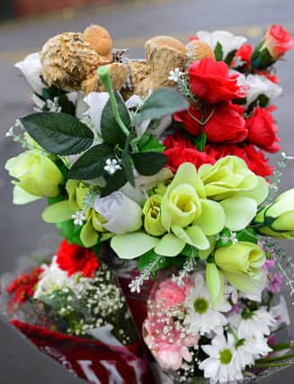 Floral Tributes on Main Road, Darnall. Picture: NSST-06-11-19-DarnallTributes-3