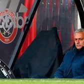 Tottenham boss Jose Mourinho sits in the Bramall Lane away dug-out, watching his side go down to Sheffield United  (Photo by JASON CAIRNDUFF/POOL/AFP via Getty Images)