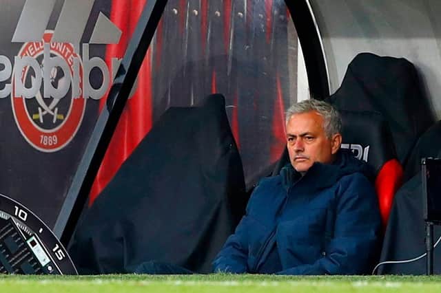 Tottenham boss Jose Mourinho sits in the Bramall Lane away dug-out, watching his side go down to Sheffield United  (Photo by JASON CAIRNDUFF/POOL/AFP via Getty Images)