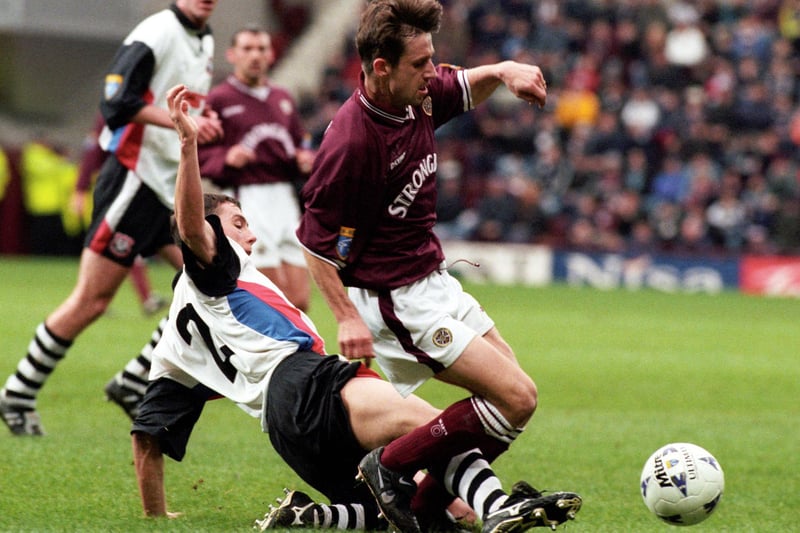 Picture shows the winger being challenged by John Robertson in the 4-1 win over Ayr. Was working as a pundit for BBC and Sky until his recent appointment as interim manager at Inverness CT after John Robertson was placed on compassionate leave.