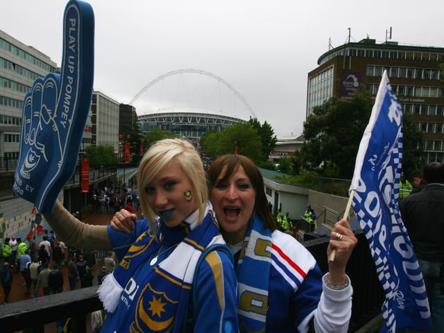 Pompey fans make their way to the stadium.