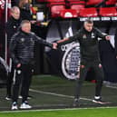 Sheffield United's English manager Chris Wilder (L) and Manchester United's Norwegian manager Ole Gunnar Solskjaer (2R) react during the English Premier League football match between Sheffield United and Manchester United at Bramall Lane earlier this season: LAURENCE GRIFFITHS/POOL/AFP via Getty Images