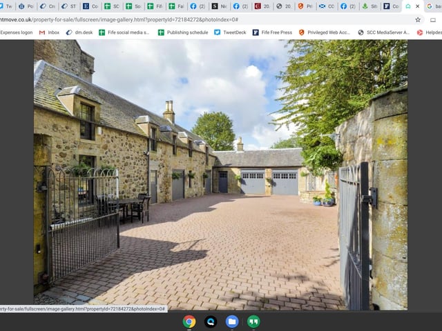 The driveway also accesses this lovely courtyard.