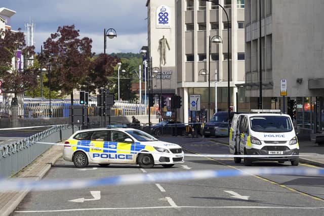 Police on Arundel Gate in Sheffield city centre after a man in his 20s was stabbed on Thursday, September 29. Two men have been charged with attempted murder. Picture: Scott Merrylees