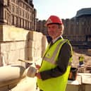Mike Bower lays the first stone of the new Peace Gardens scheme