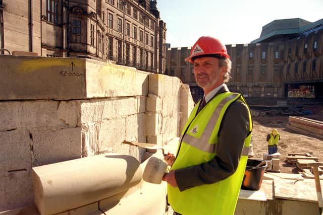 Mike Bower lays the first stone of the new Peace Gardens scheme