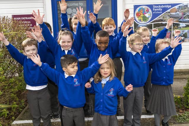 Pupils at Royd Nursery Infant School celebrate their latest Ofsted report