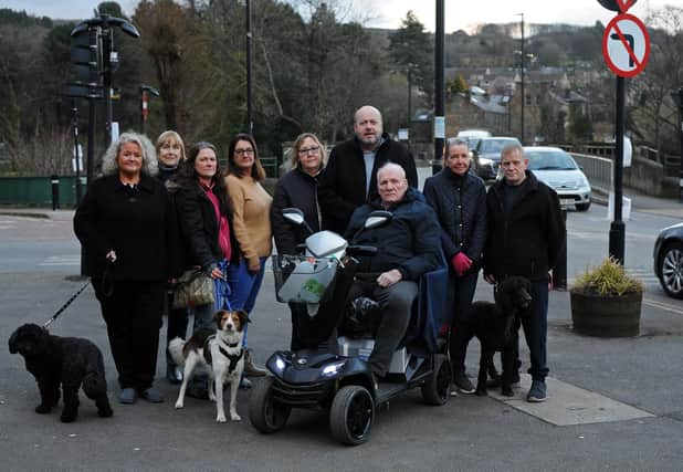 Oughtibridge Road Safety Action Group Chairman Gary Chamberlain (back middle), Amanda Rawson, Committee member, Wendy Godber, Social Media Liason Officer, Jennifer Murphy, Landlady at The Cock Inn, pictured with concerned residents at the Bridge Hill junction.