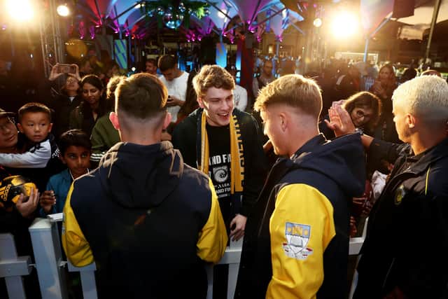 Central Coast Mariners players interact with fans during the A-League Men's Grand Final Media Opportunity at Moore Park: Matt King/Getty Images for APL