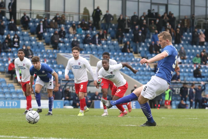 Danny Rowe scored a late penalty to keep Town's play-off hopes alive.