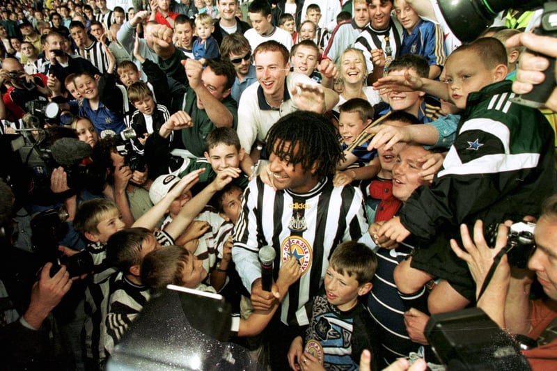 Ruud Gullit, former Chelsea boss and Dutch international, is surrounded by fans after he was appointed as Newcastle manager after Kenny Dalglish resigned.