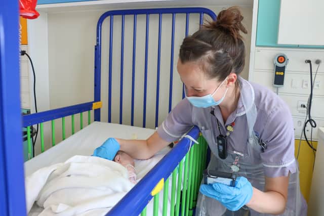She may not know it, but two-month-old Alice has just made a Sheffield Children's first – the first patient to have her observations recorded electronically.