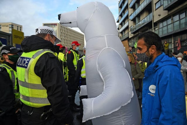 A climate activist dressed as a polar bear