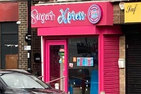 Pictured is the Sugar Xpress milkshake and ice cream bar on Firth Park Road, at Firth Park, Sheffield, after a shooting on Thursday evening, January 26, left five bullet holes in the lower part of the bar's window. Picture courtesy of a Sheffield Star reader.