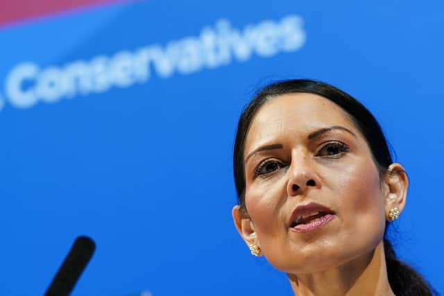 BLACKPOOL, ENGLAND - MARCH 19: Priti Patel MP, Secretary of State for the Home Department delivers her keynote speech during the Conservative Party Spring Conference at the Blackpool Winter Gardens on March 19, 2022 in Blackpool, England. The Spring conference in Blackpool offers a chance for party delegates to meet senior Party figures, attend training sessions, hear speeches, and meet up with fellow members and activists to explore Conservative plans for the future of the country. (Photo by Ian Forsyth/Getty Images)