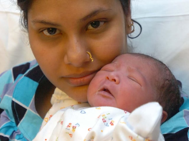 Sultana Mahbuba of Malvern Road, Darnall, with her baby girl born at 03.13am on New Year's Day at Jessops Hospital, Sheffield, weighing 7 lbs 7 oz