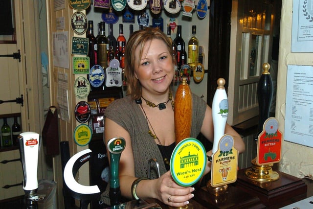 Landlady Keeley Ayres behind the bar at The Robin Hood, on Greaves Lane, Stannington, Sheffield