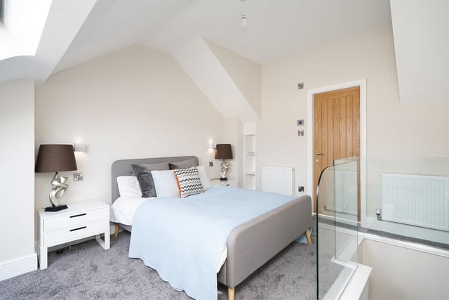 This is the second floor bedroom, located at the top of the second staircase. It is the master bedroom and the only bedroom with an en-suite.