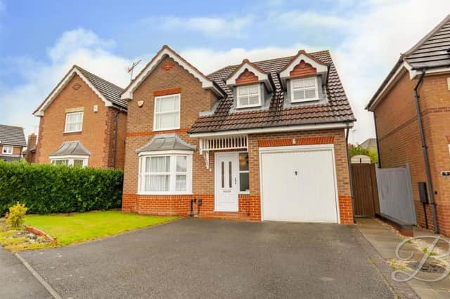 The attractive frontage of the four-bedroom, detached house on Twinyards Close in Sutton. It is described as "a real treat" by estate agents Buckley Brown, who are inviting offers of more than £330,000.