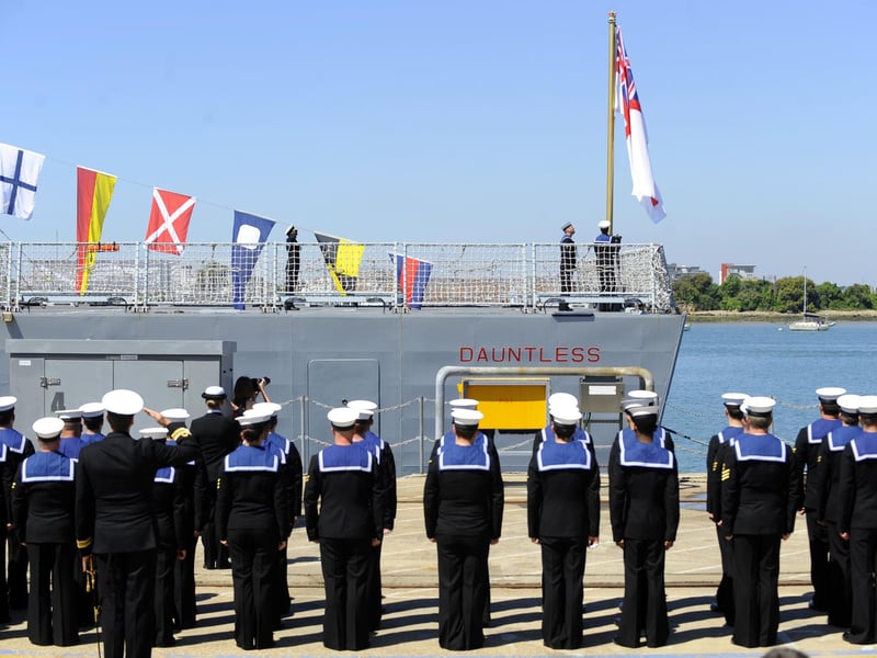 3rd June 2010.
The White Ensign is hoisted aboard HMS Dauntless. Commissioning Ceremony of HMS Dauntless, at Victoria Jetty, Her Majesty's Naval Base, Portsmouth.
Picture: Allan Hutchings (101720-009)