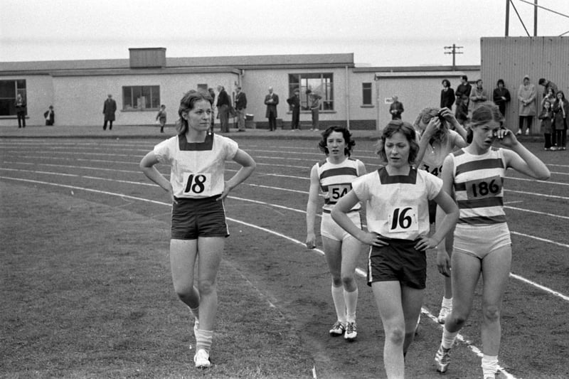 Hillhead High School twins Chrissie McMeekin & Evelyn McMeekin after the 100m final of the Glasgow Corporation Championships, held at Scotstoun in May 1971.