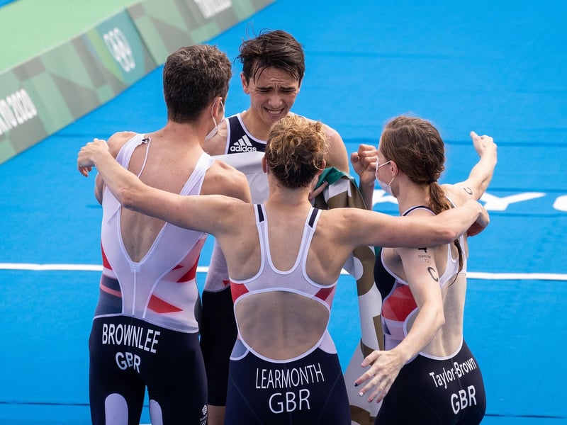 The quartet celebrated their bronze medal in the mixed triathlon at the weekend.