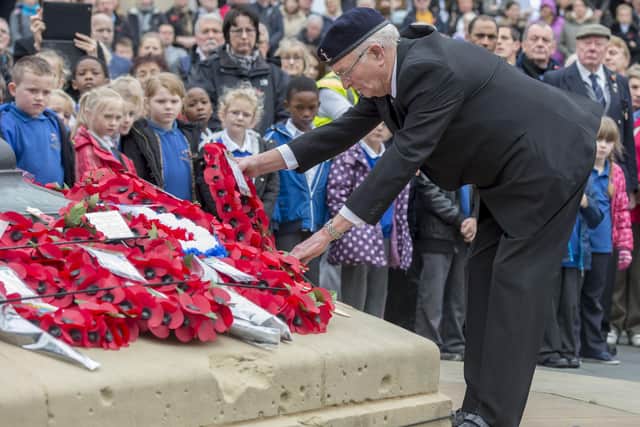 Bryan Green pictured laying a wreath during the Armistice Day ceremony