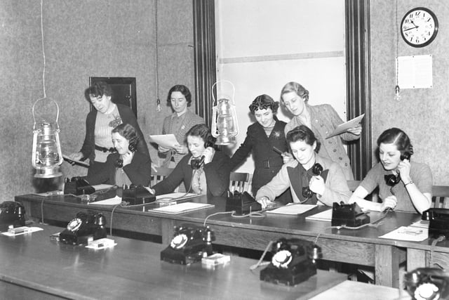 The Sunderland Air Raid Precaution (ARP) centre where the telephonists are handling lots of calls in January 1940 - with a smile.