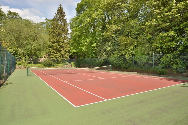 In the grounds is a full sized tennis court that has recently been resurfaced, and sits surrounded by trees amid the sprawling gardens.