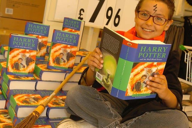 Joshua Robinson gets in some Harry Potter reading at ASDA store on Bawtry Rd Doncaster on the night of the release of The Half-Blood Prince. Dated July 16, 2005.