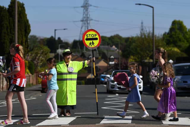 Treeton Lollypop lady, Glynnis Bolton, who has done the job for 20 years. Celebrates her 65th today.
Picture Jonathan Gawthorpe
24th April 2020.